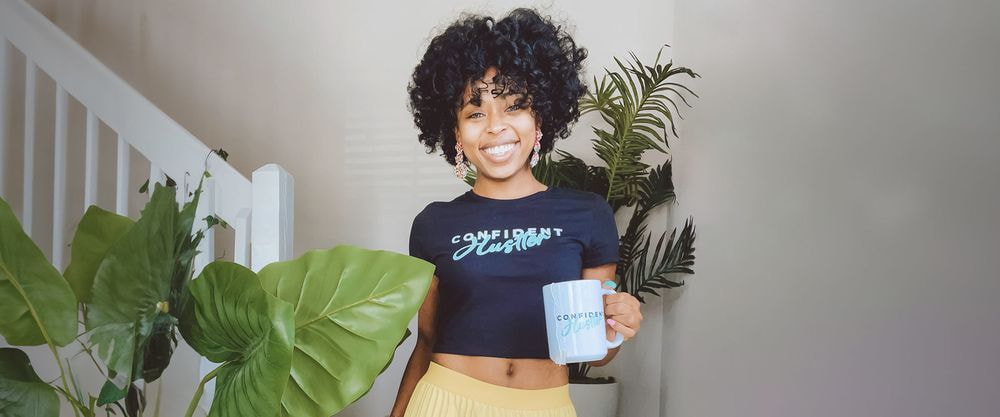 a woman holding a mug