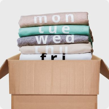 Foto von bedruckten T-Shirts in einer Box