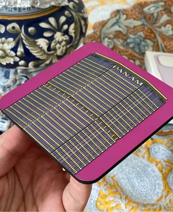 Custom coaster with detailed lines on pink background